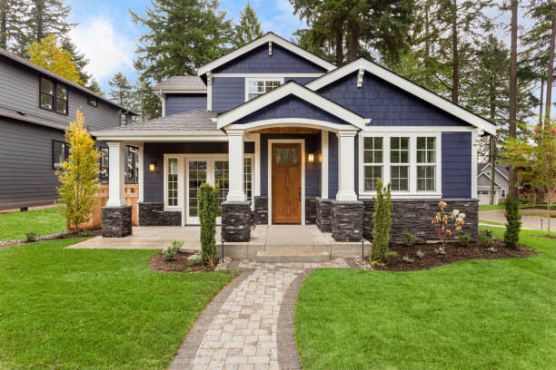 Home with deep blue exterior paint, bright white trim, and smooth satin finish by an exterior painter in Kennett Square, PA.
