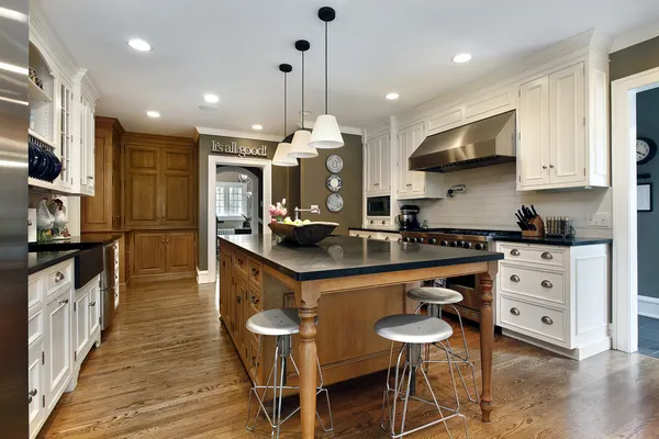 Kitchen with white painted cabinets and contrasting trim by a painter in Oxford, PA.